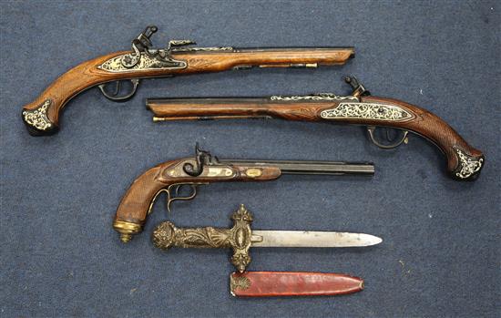 Three 18th century style flintlock pistols and an Eastern dagger